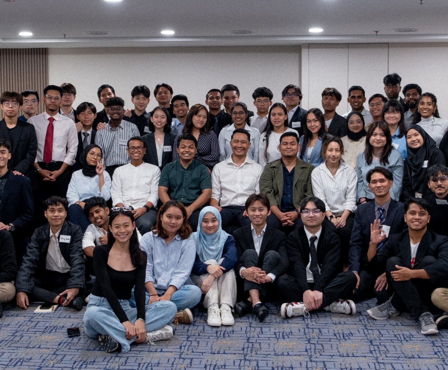KL Debate participants and trainers in a group photo at a session in Kuala Lumpur