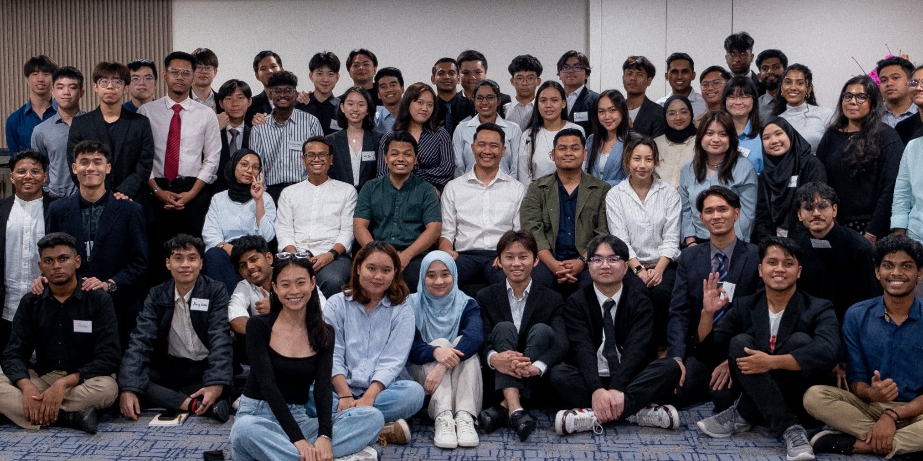 Group photo of KL Debate participants and trainers at a session in Kuala Lumpur